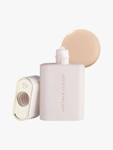 Westman Atelier Vital Skincare Dewy Foundation Drops pale pink dropper bottle of skin tint with cap to the side and dot swatch behind it on light gray background