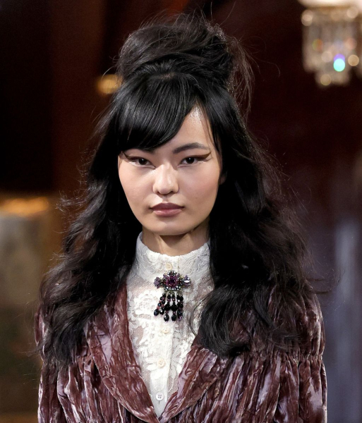 Image may contain Angela Zhang Black Hair Hair Person Adult Face and Head