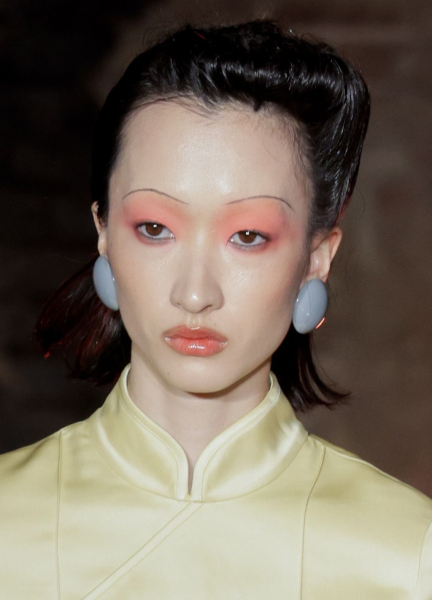 Image may contain Adult Person Head Face Hair Body Part and Neck